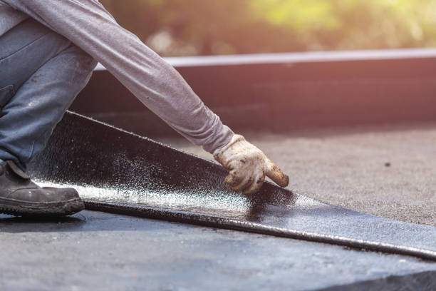 Professional Basement Waterproofing technician working in Geneseo, KS